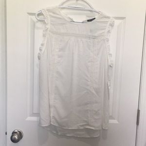 White sleeveless blouse